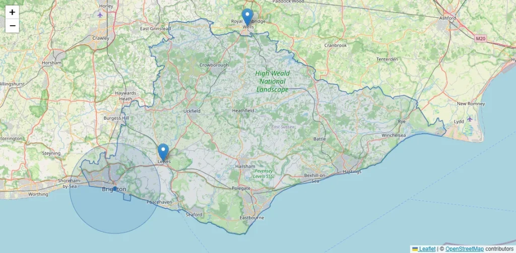 Coverage map of East Sussex: the county outline shaded, branch pins at Lewes and Tunbridge Wells, and a shaded six-mile circle around Brighton